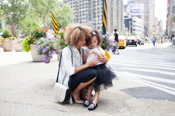 Mother and daughter fighting summer allergies