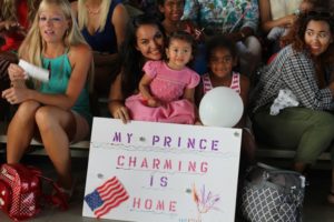 Military family waits for their family member to return home from deployment