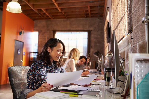 Woman productively works in asthma-friendly workplace