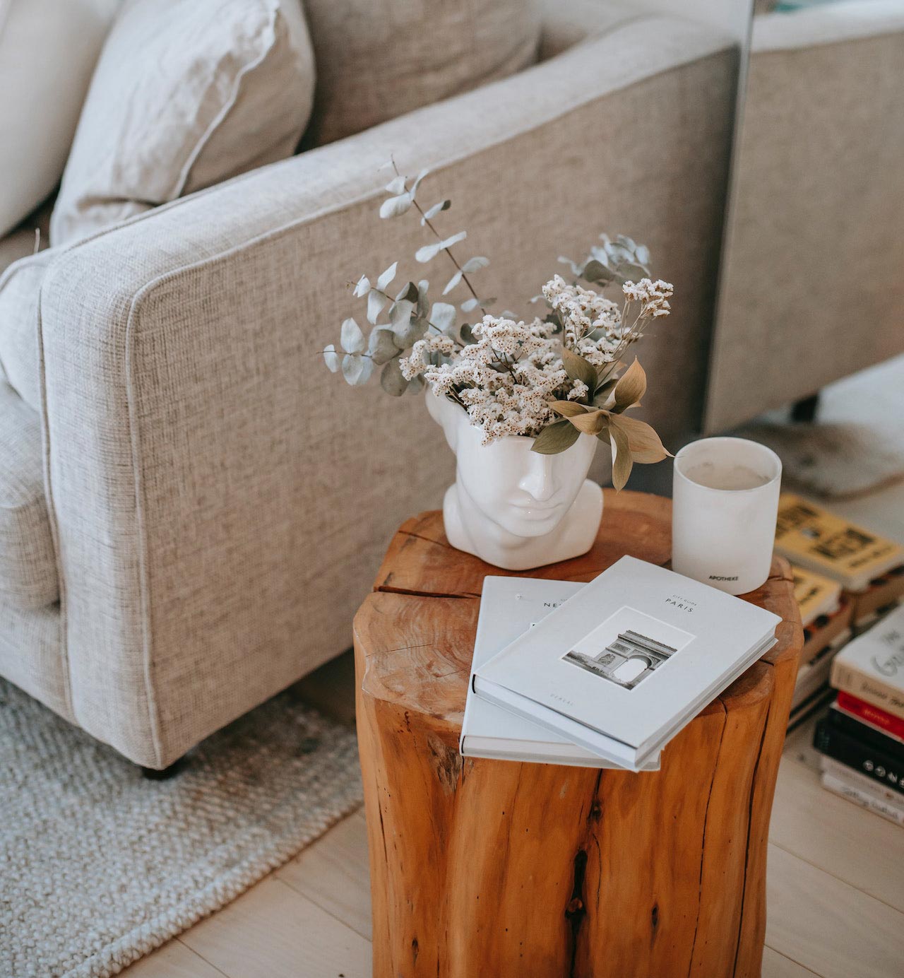 Wooden trunk as a living room table with decorative items.